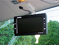 Back eye camera color monitor suspended in the cab